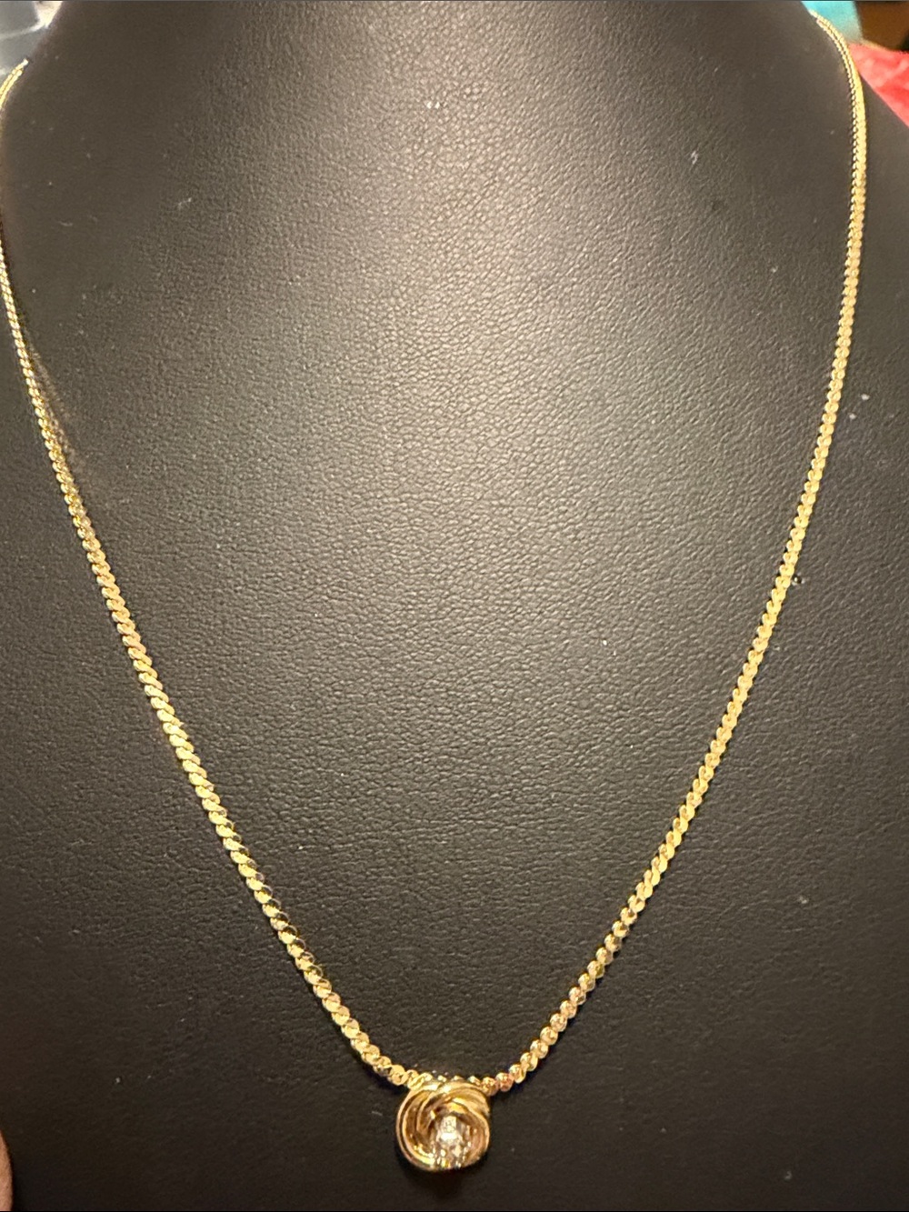Like new 18” gold tone necklace with tiny rhinestone